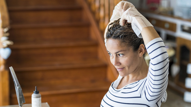 Woman uses home hair dye