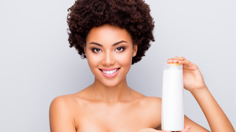 Woman with hair product