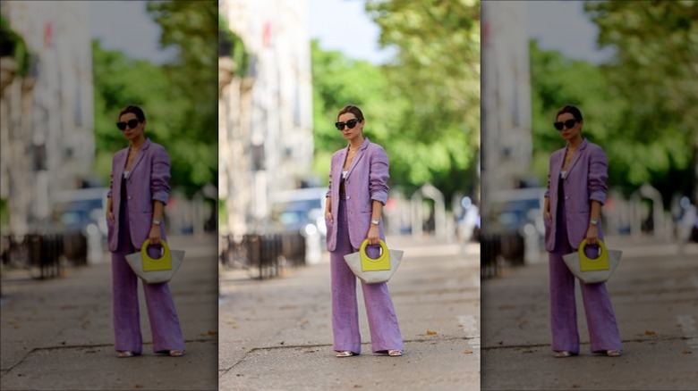 Woman in purple linen suit