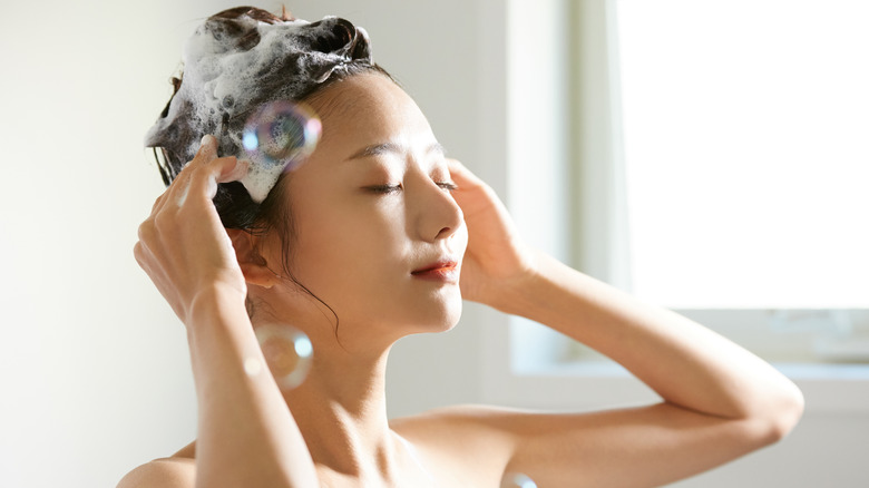 Woman washing her hair