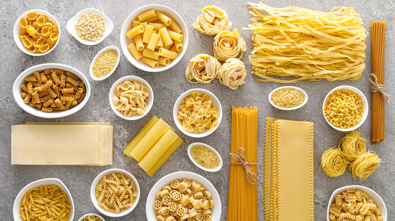 Different types of dry pasta on a table