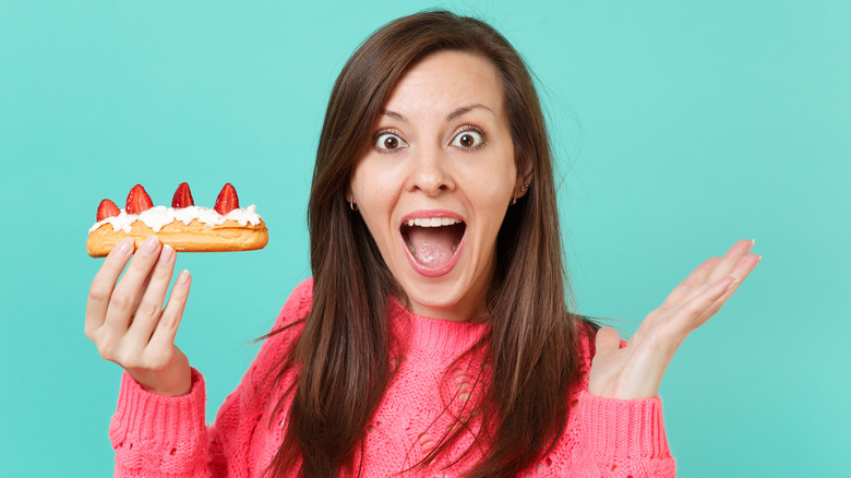 Woman exudes excitement over her strawberry dessert 