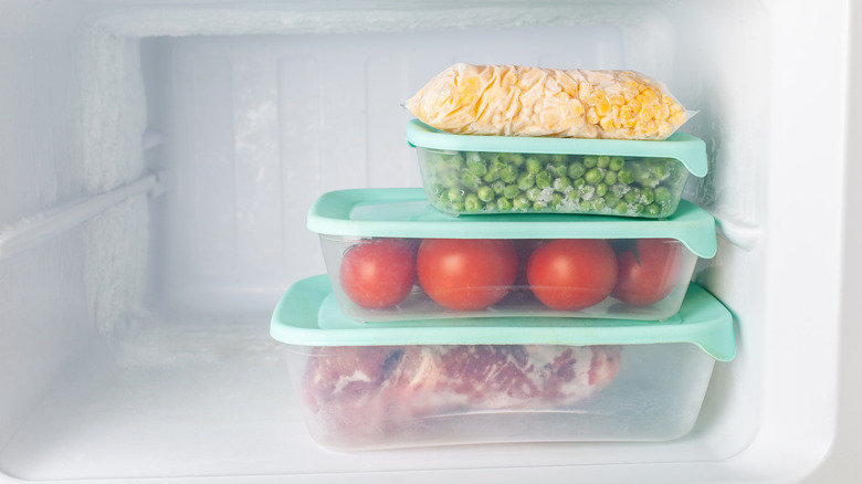 Vegetables in containers in fridge