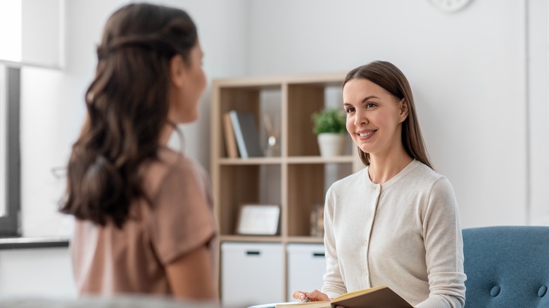 Woman talking with therapist