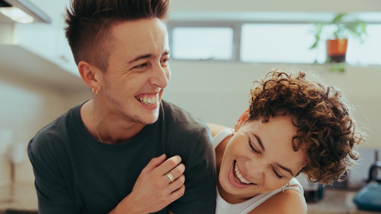 Couple dancing in kitchen