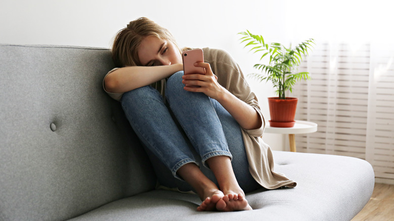 Woman looking at phone