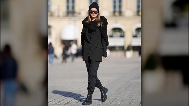 Woman in all-black outfit 