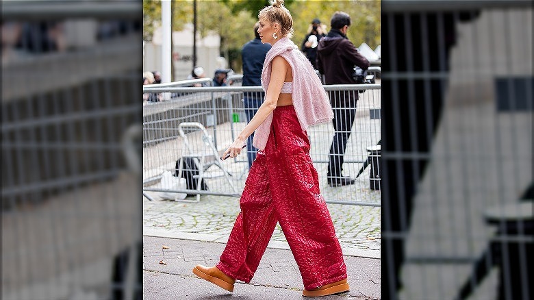 Woman in baggy pants and bralette 