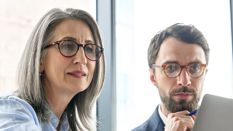 Man and woman with glasses