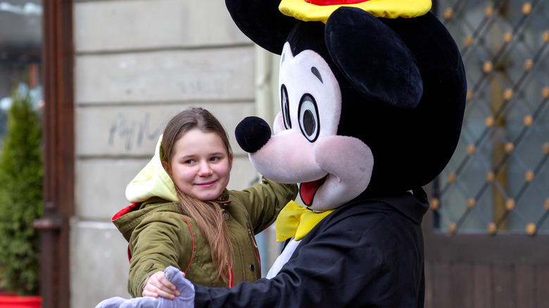 Girl dancing with Mickey