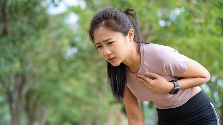 Woman having asthma attack