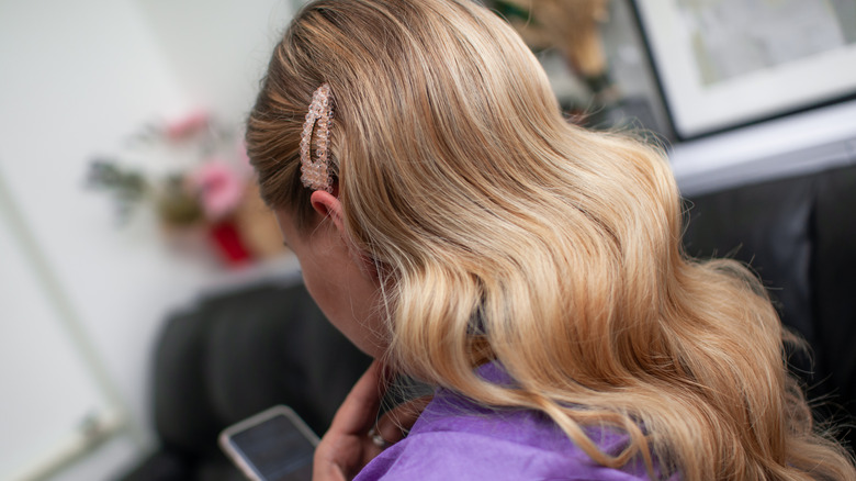 Woman with blonde wavy hair