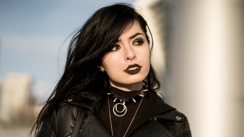 Young woman with a punk goth style 