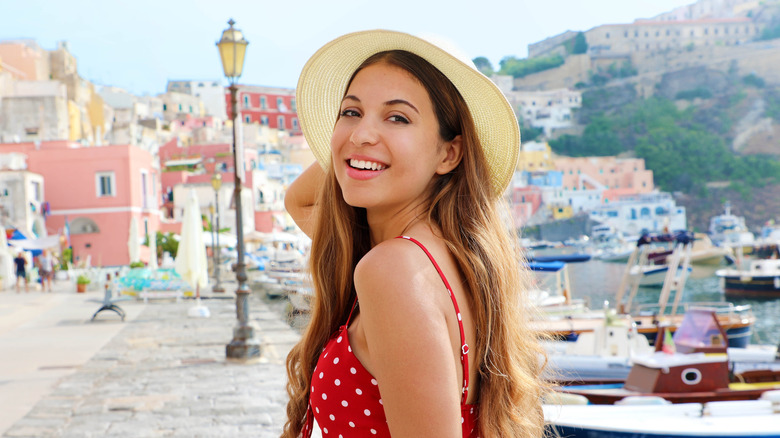 woman wearing a red polka dot dress 