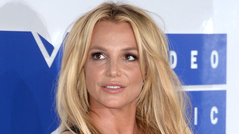 Britney Spears posing on the red carpet at an event