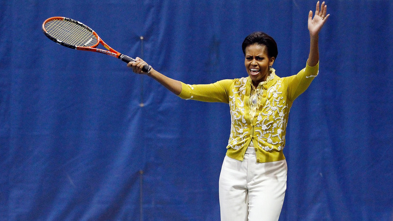 Michelle Obama playing tennis