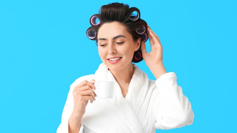 Woman with velcro rollers in her hair