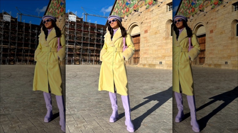 purple beret and purse with yellow jacket