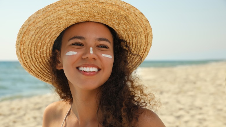 Woman wearing hat in the sun