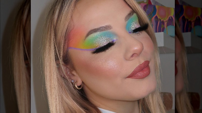 Woman with glittery, pastel eyeshadow