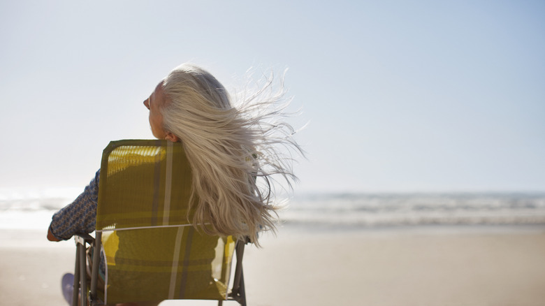 A woman relaxing on the beach