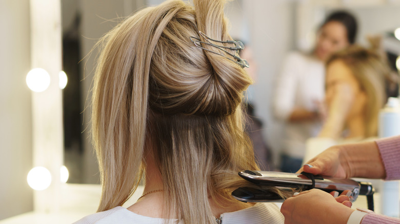 Woman's hair clipped up