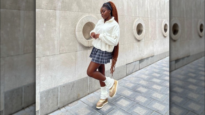 Woman in leg warmers with skirt