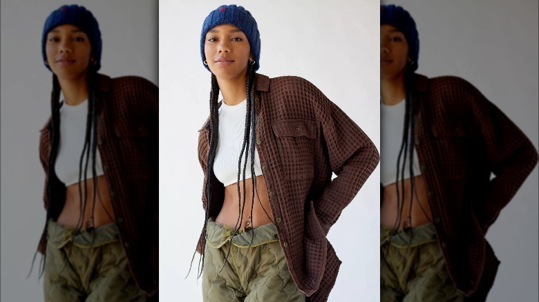 Urban Outfitters model wears brown waffle button down shacket