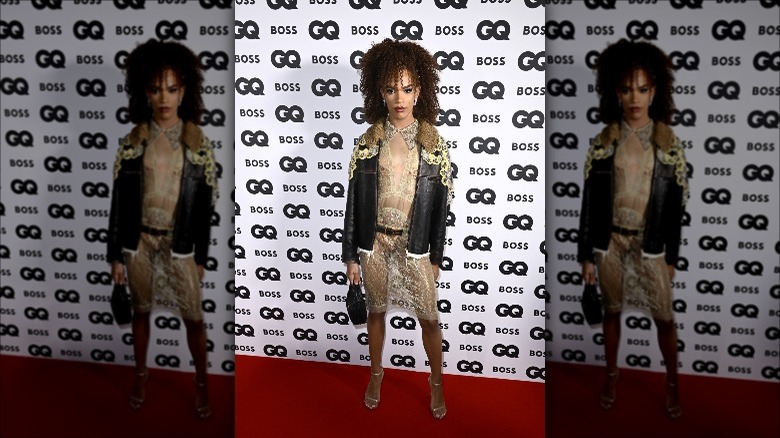 Sheer dress paired with leather jacket on GQ red carpet