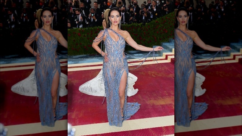 Lily James at the May 2022 met gala in blue lace gown