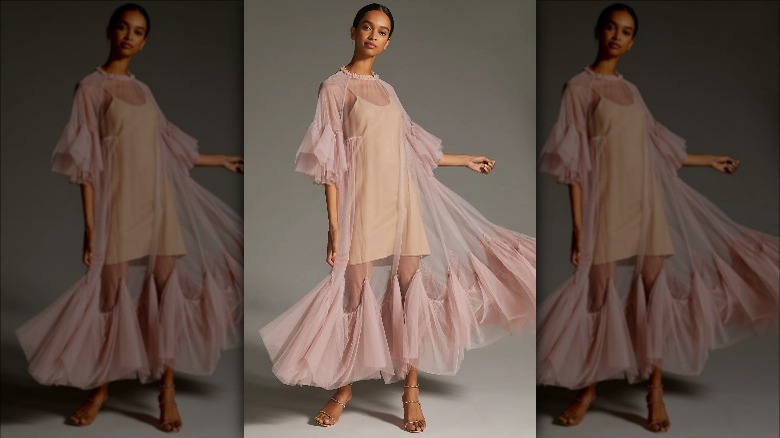 Anthropologie model wears sheer tulle dress