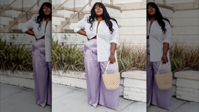 woman posing with flowy silk pants