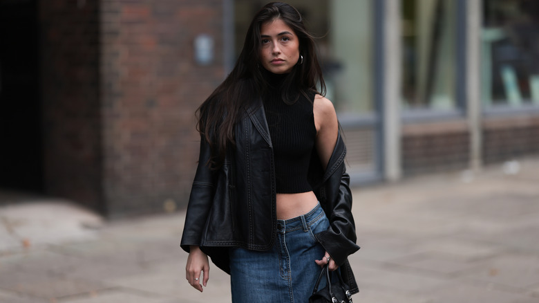 Model in black leather jacket