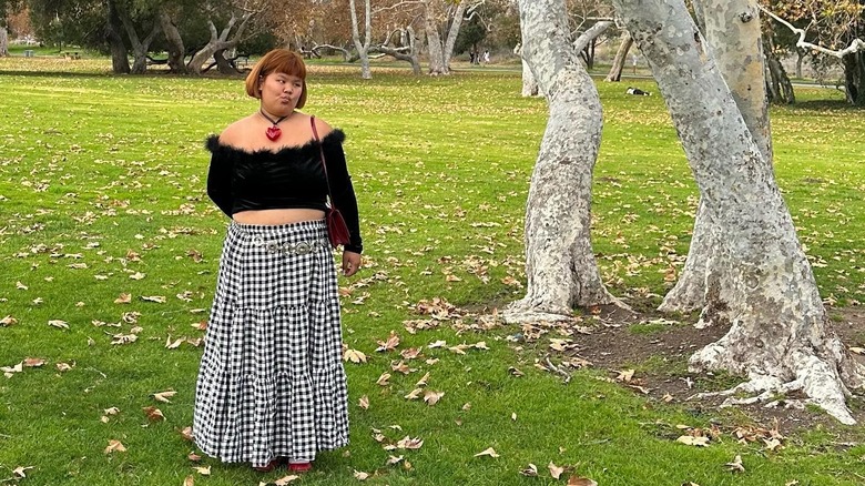 Girl posing below tree