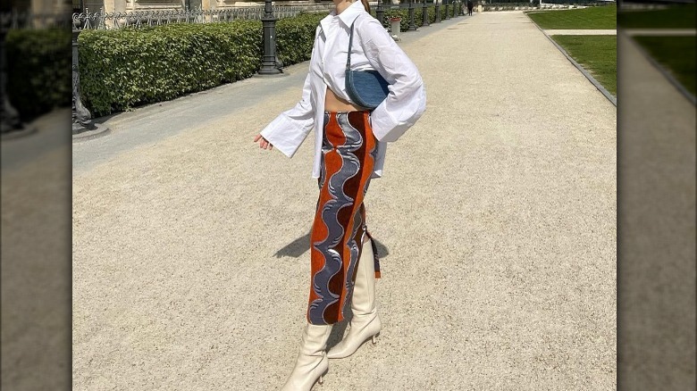 patterned skirt with boots and dress shirt