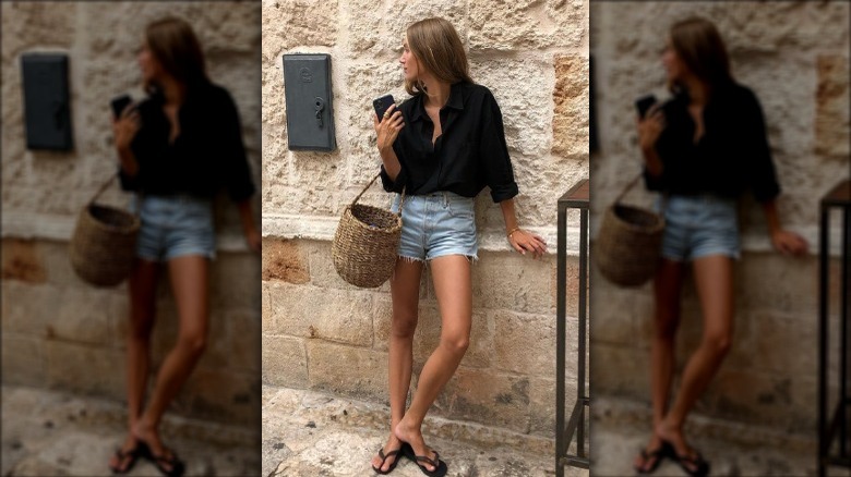 Black button-down and denim shorts outfit