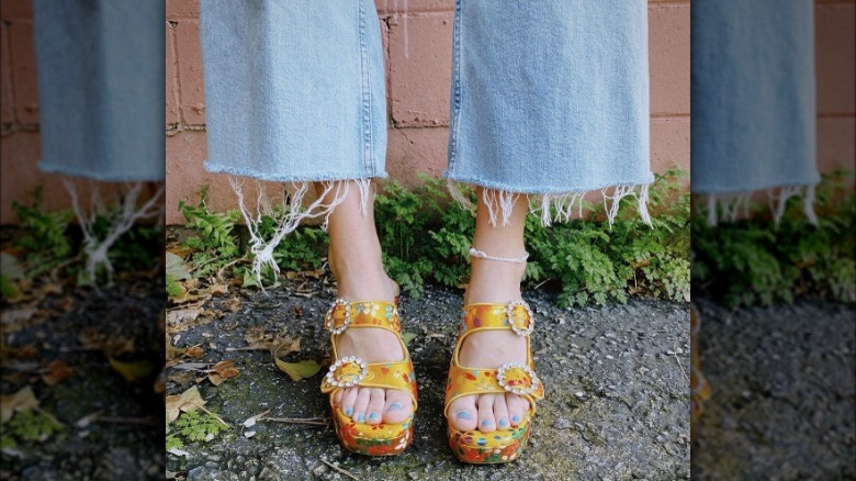 Personal wearing bright yellow sandals