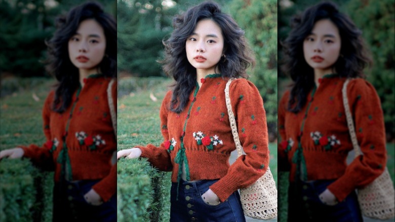 woman in embroidered cardigan