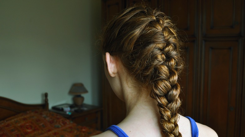 A woman with a French braid