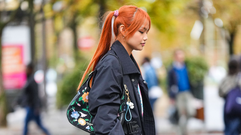 A woman with high pigtails