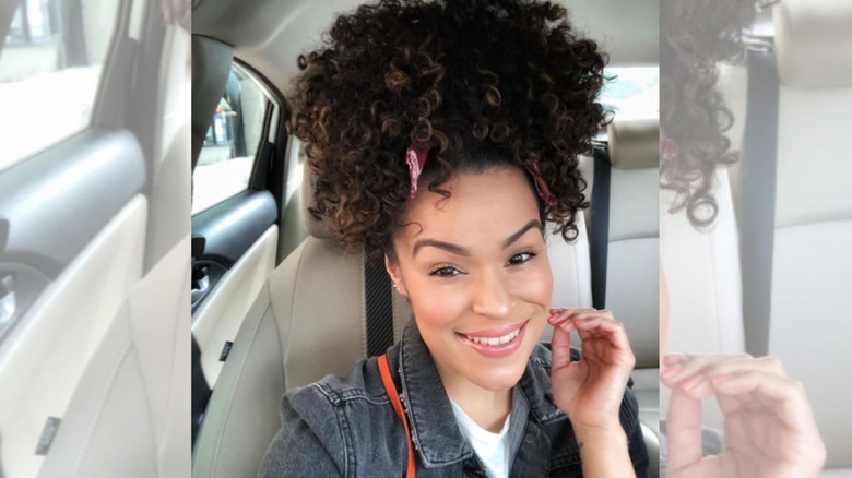 Woman wearing bandana with a curly updo