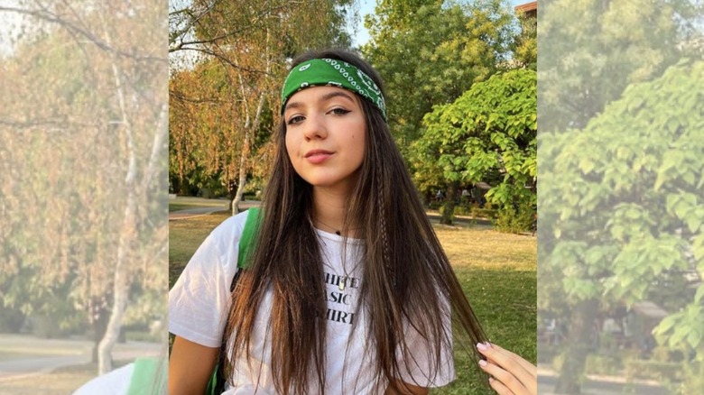 Woman wearing bandana as headband