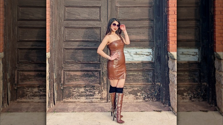 woman wearing leather dress