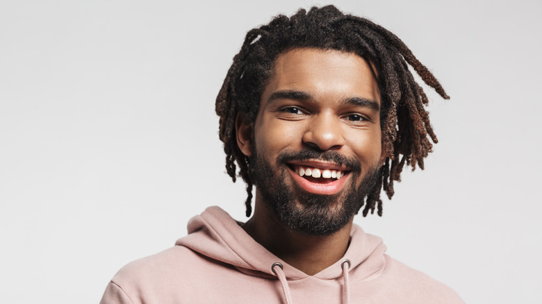 man with dreadlocks 