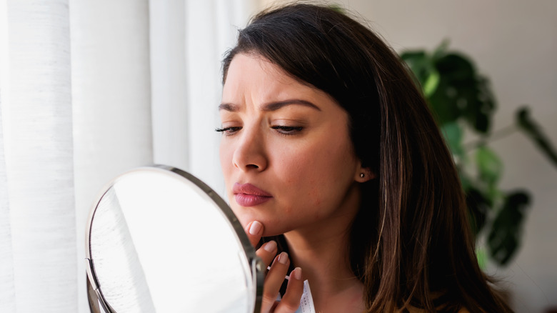 Woman with irritated skin