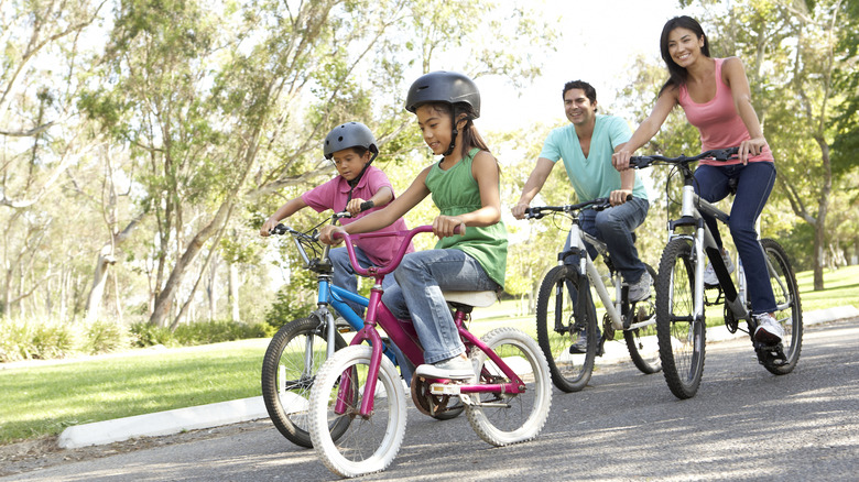 Family riding bikes