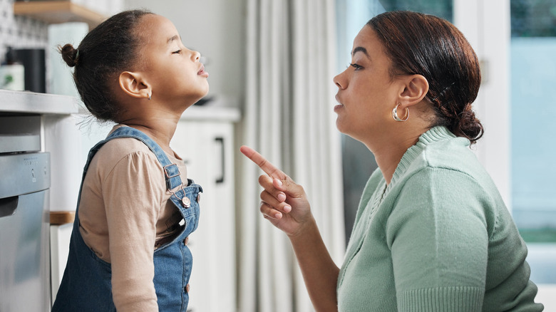 Mom telling off daughter