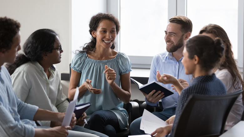 Gathering men and women in class