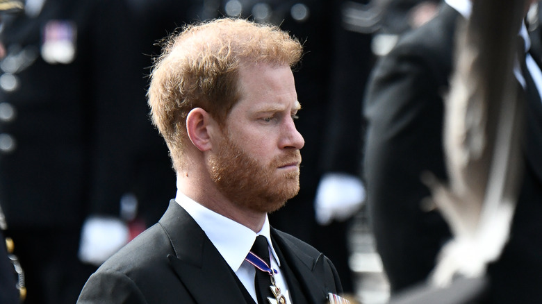 Prince Harry look serious Queen funeral