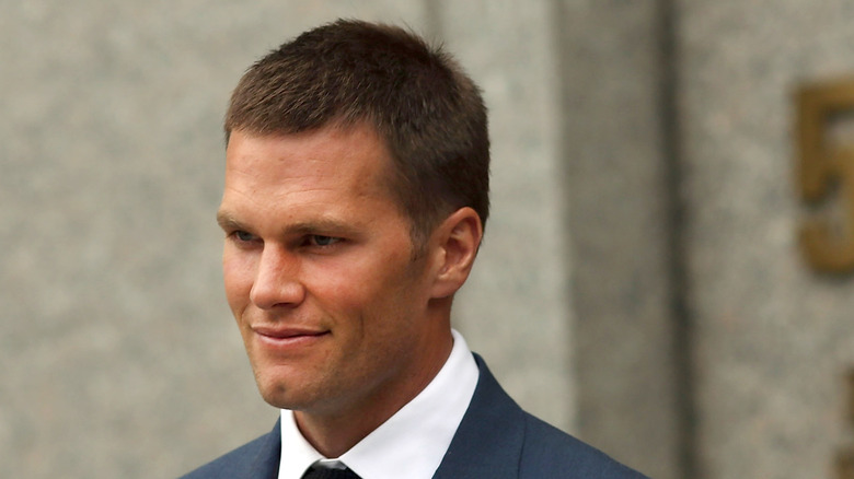 Tom Brady wearing a suit 